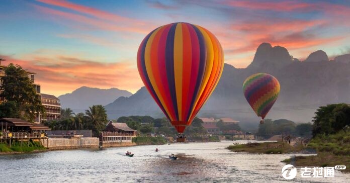 The-tourist-town-of-Vang-Vieng-in-Laos-696x364 (1).jpg